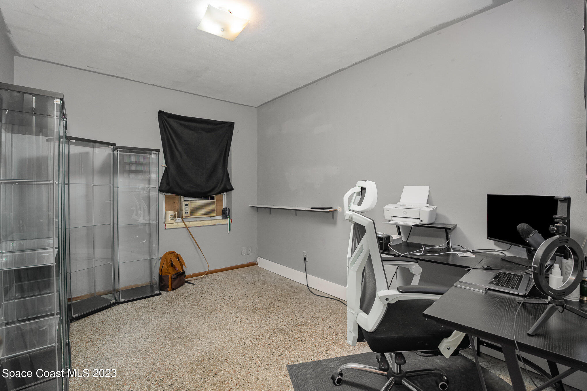 109 Cherry Street Melbourne, FL 32901 - Photo 12 of 31 a view of a workspace with furniture