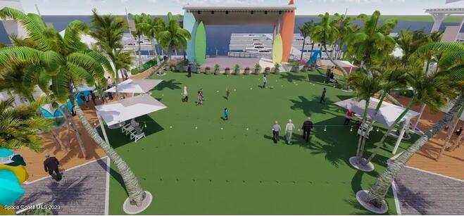 109 Cherry Street Melbourne, FL 32901 - Photo 28 of 31 a green field with flowers in front of it