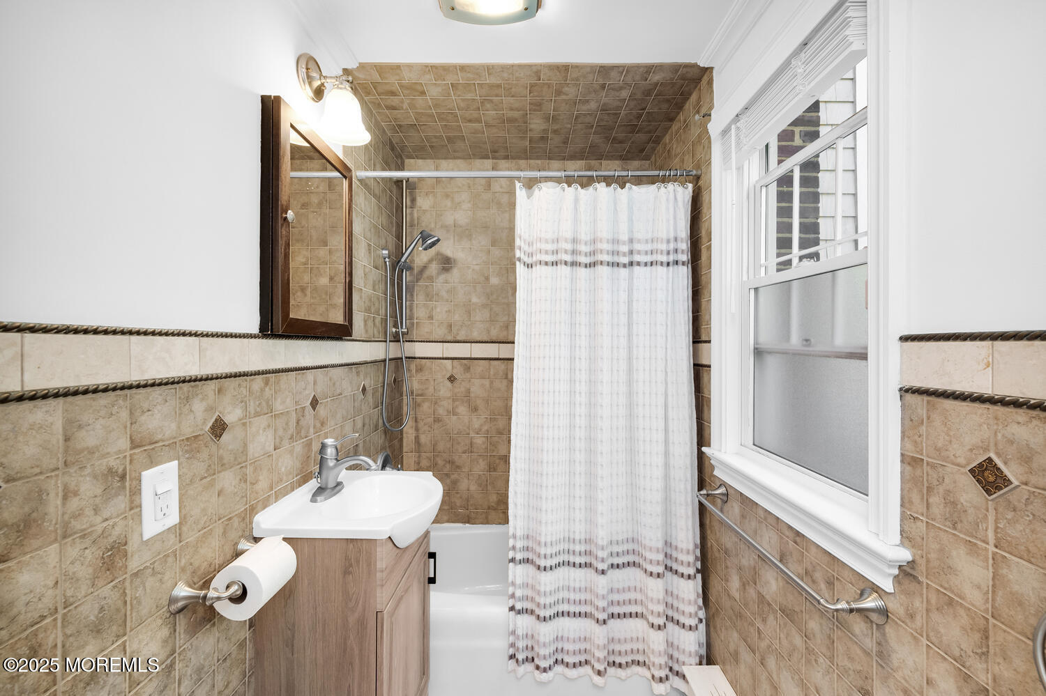 120 Bowne Road Middletown, NJ 07716 - Photo 14 of 25 a bathroom with a sink and mirror