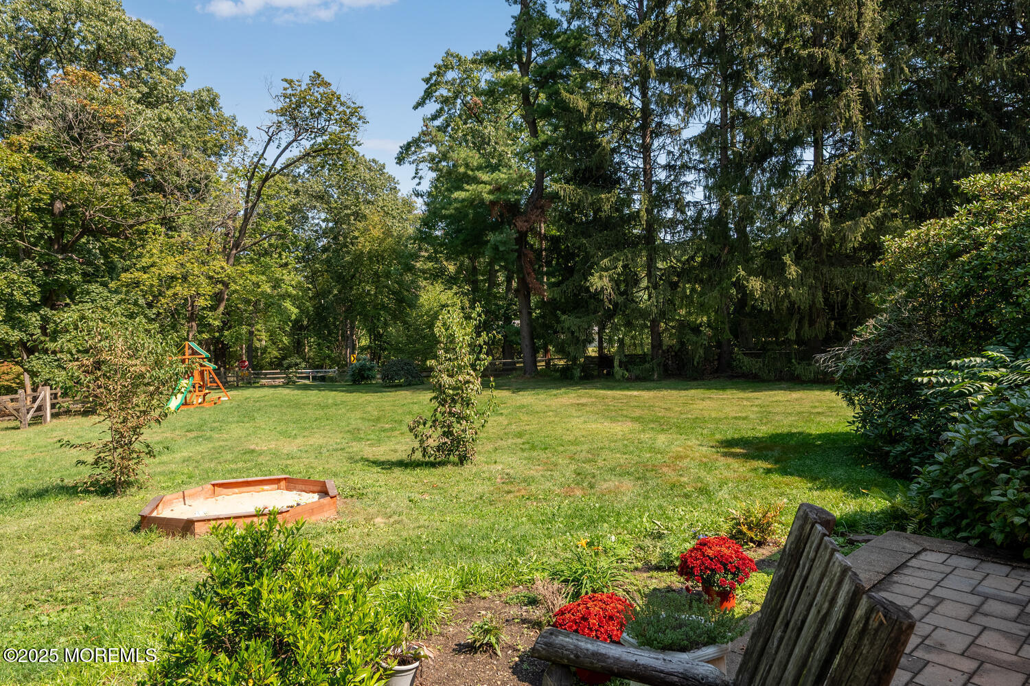 120 Bowne Road Middletown, NJ 07716 - Photo 22 of 25 a view of a garden with a tree