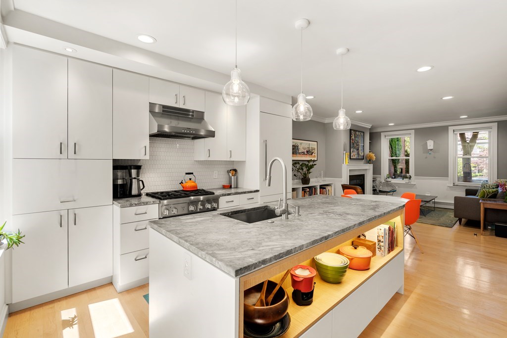 5 Auburn Street, Unit 1 Boston, MA 02129 - Photo 1 of 25 a kitchen with stainless steel appliances granite countertop a sink and cabinets