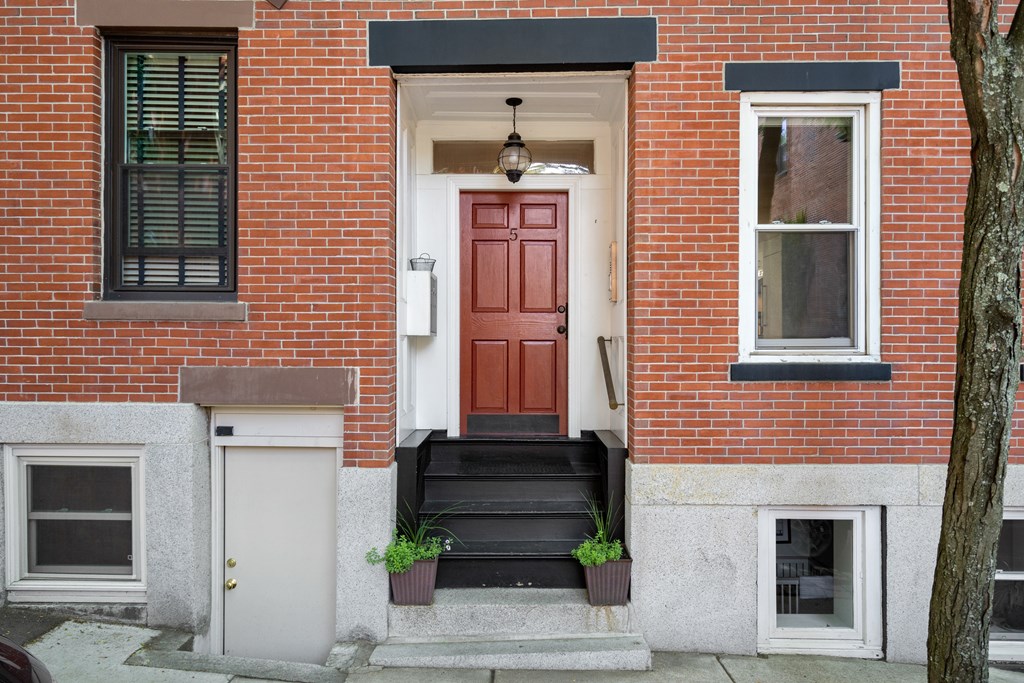 5 Auburn Street, Unit 1 Boston, MA 02129 - Photo 24 of 25 a front view of a house with a window