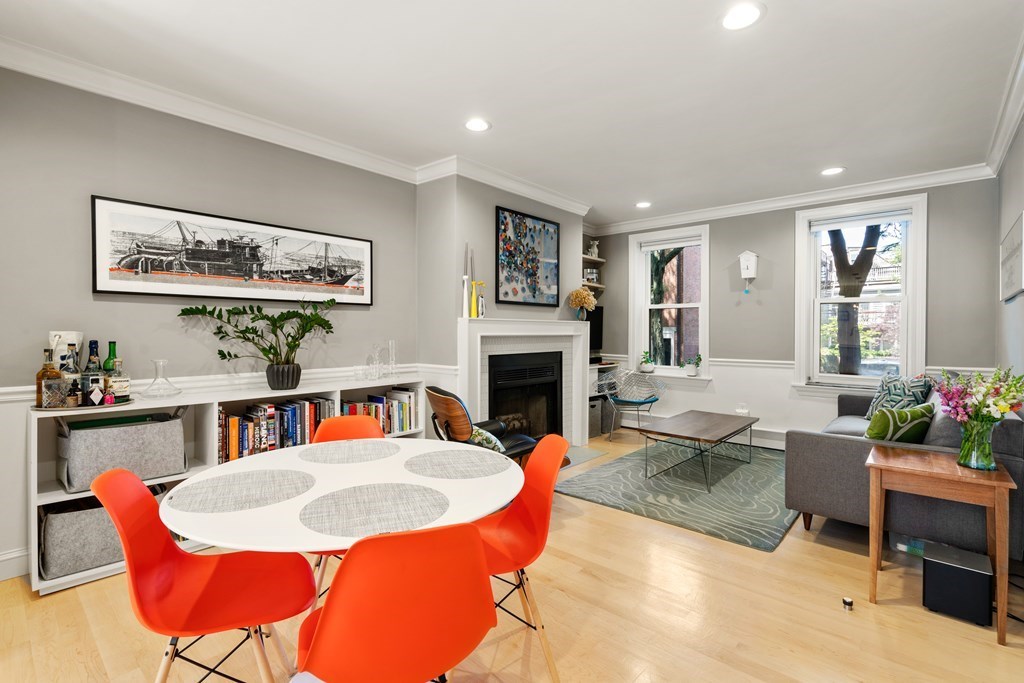5 Auburn Street, Unit 1 Boston, MA 02129 - Photo 6 of 25 a living room with furniture a rug and a fireplace