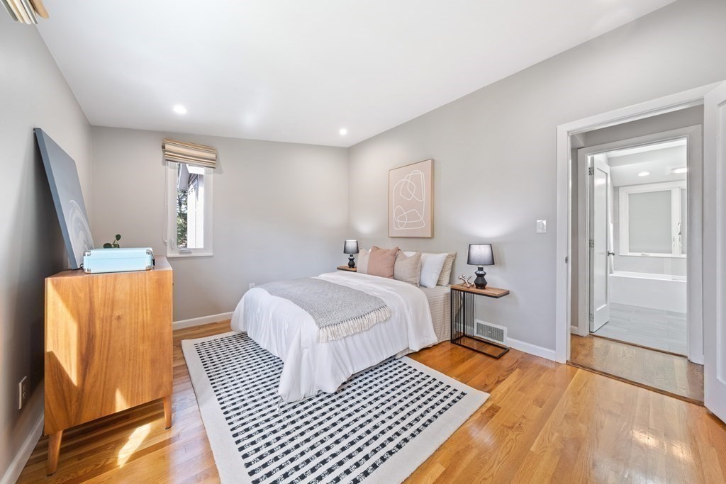 16 Marshall Road Winchester, MA 01890 - Photo 13 of 42 a bedroom with double bed and a window