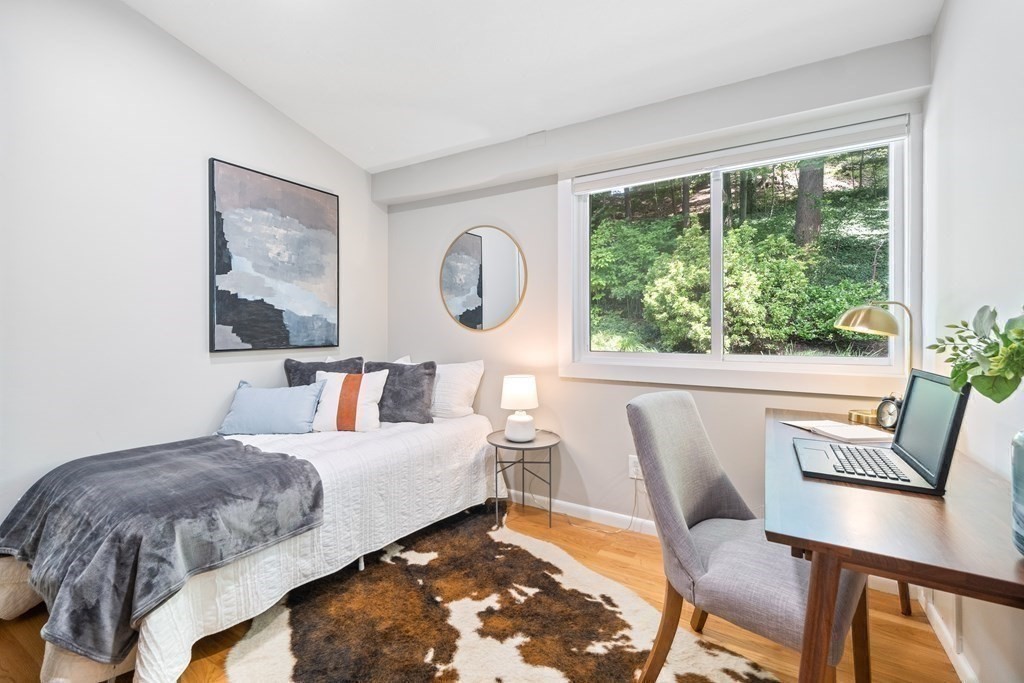 16 Marshall Road Winchester, MA 01890 - Photo 15 of 42 a living room with furniture and a large window