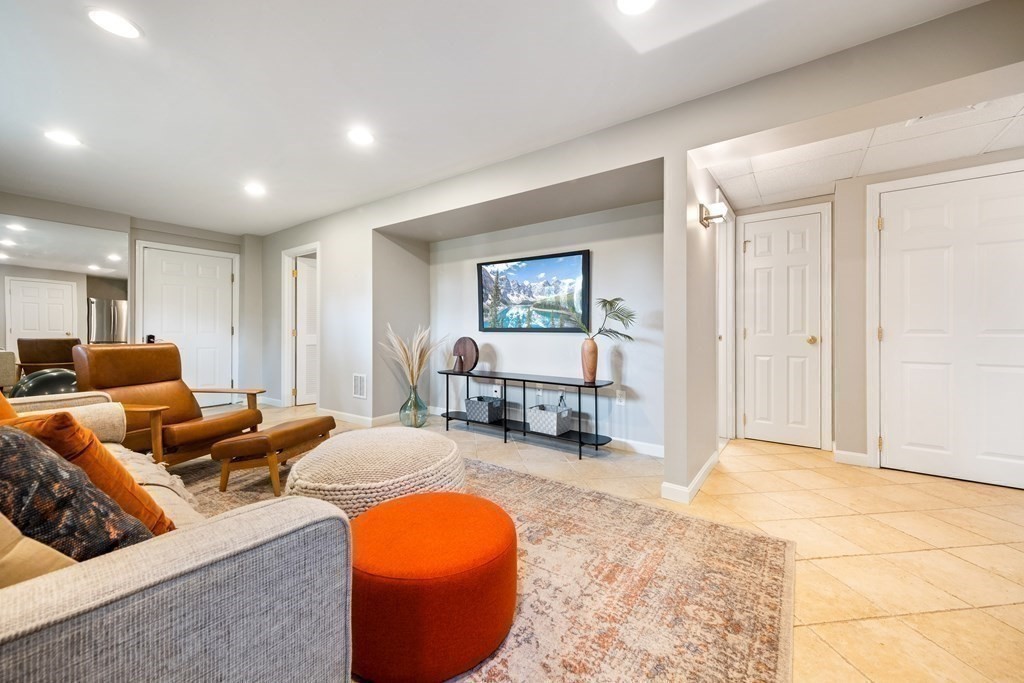 16 Marshall Road Winchester, MA 01890 - Photo 26 of 42 a living room with furniture and a large window