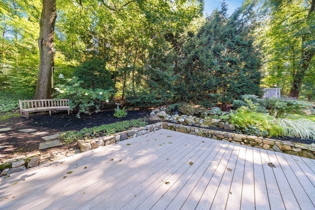 16 Marshall Road Winchester, MA 01890 - Photo 36 of 42 a wooden bench with view of trees