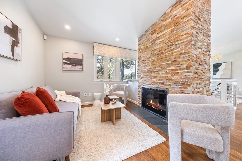 16 Marshall Road Winchester, MA 01890 - Photo 8 of 42 a living room with furniture and fireplace