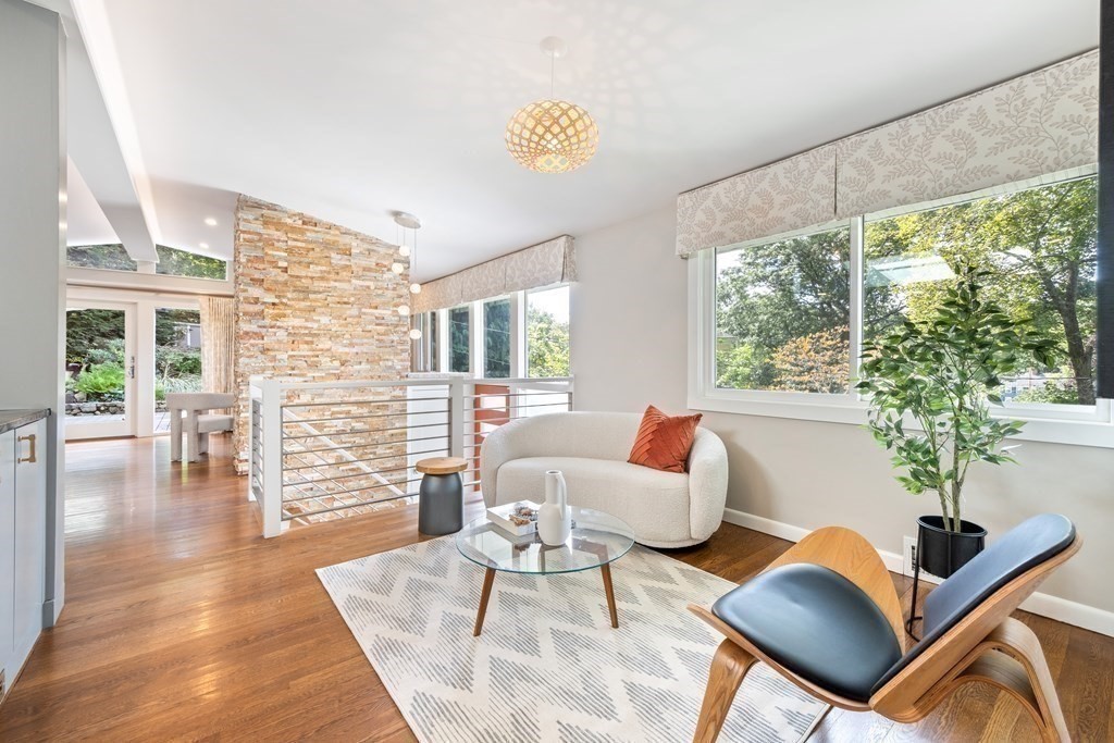 16 Marshall Road Winchester, MA 01890 - Photo 10 of 42 a living room with furniture and a large window