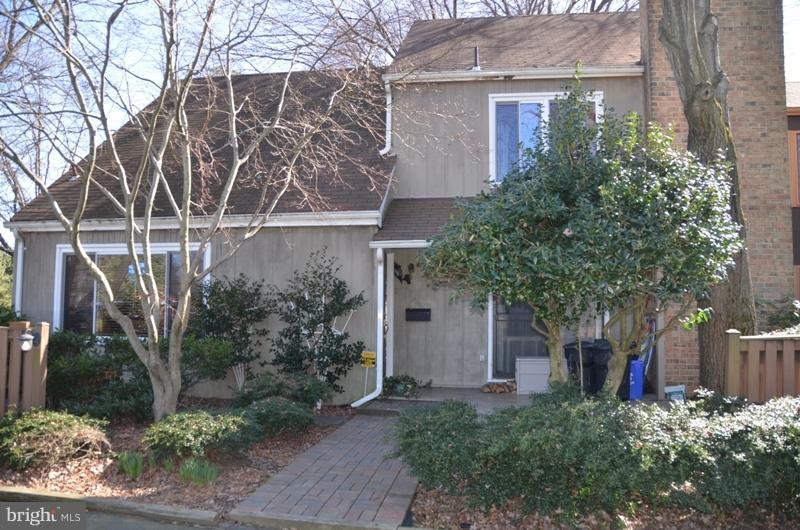 10801 Hunt Club Road Reston, VA 20190 - Photo 1 of 6 front view of a house with a tree