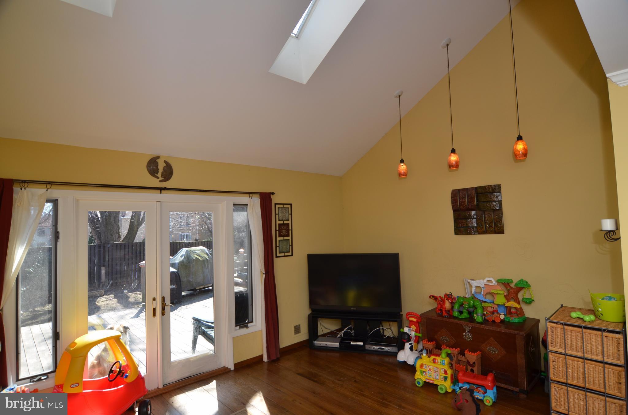 10801 Hunt Club Road Reston, VA 20190 - Photo 3 of 6 a living room with furniture