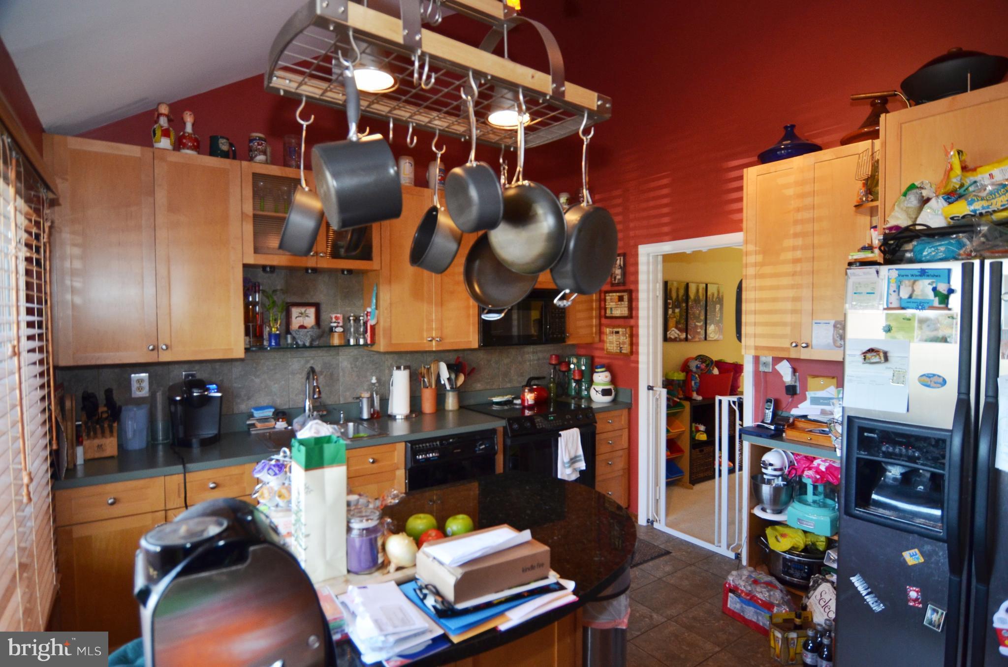 10801 Hunt Club Road Reston, VA 20190 - Photo 4 of 6 a room with lots of stuff and appliances