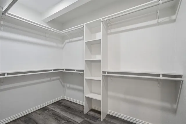a view of an empty walk in closet