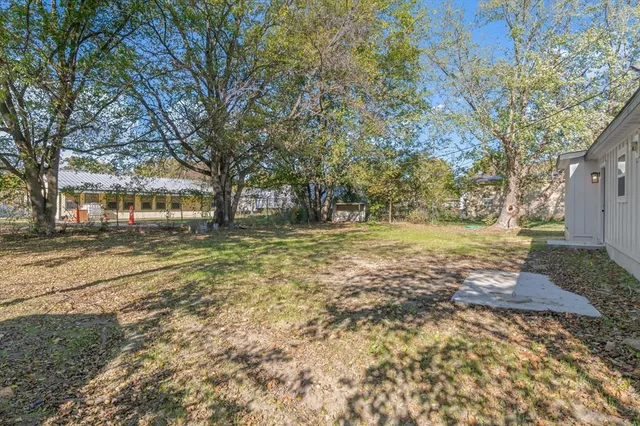 a view of road with trees