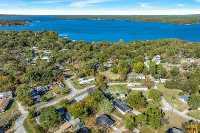 a view of a large body of water with a building in the background