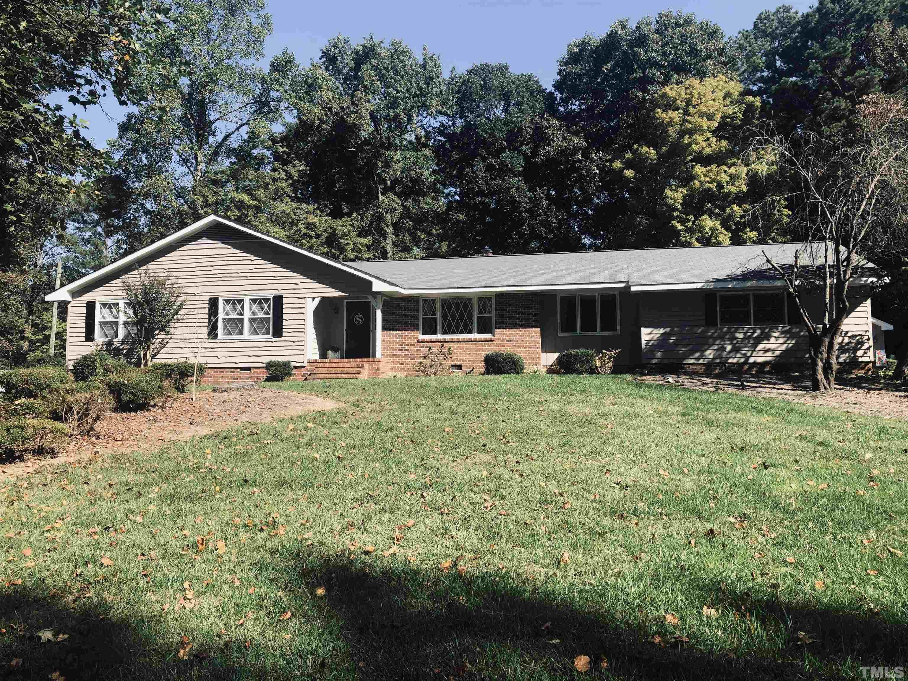 4909 Will-O-Dean Road Raleigh, NC 27616 - Photo 15 of 15 a front view of a house with garden