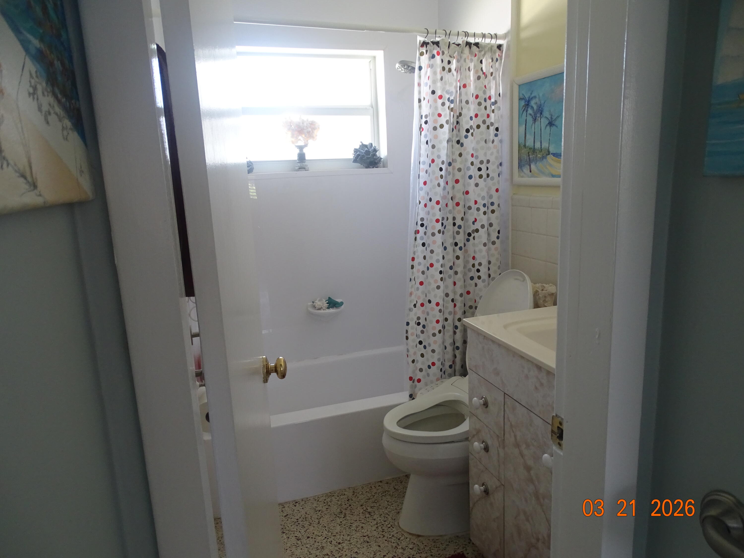 4760 Northwest 2nd Terrace Boca Raton, FL 33431 - Photo 17 of 25 a bathroom with a bathtub a toilet and a shower