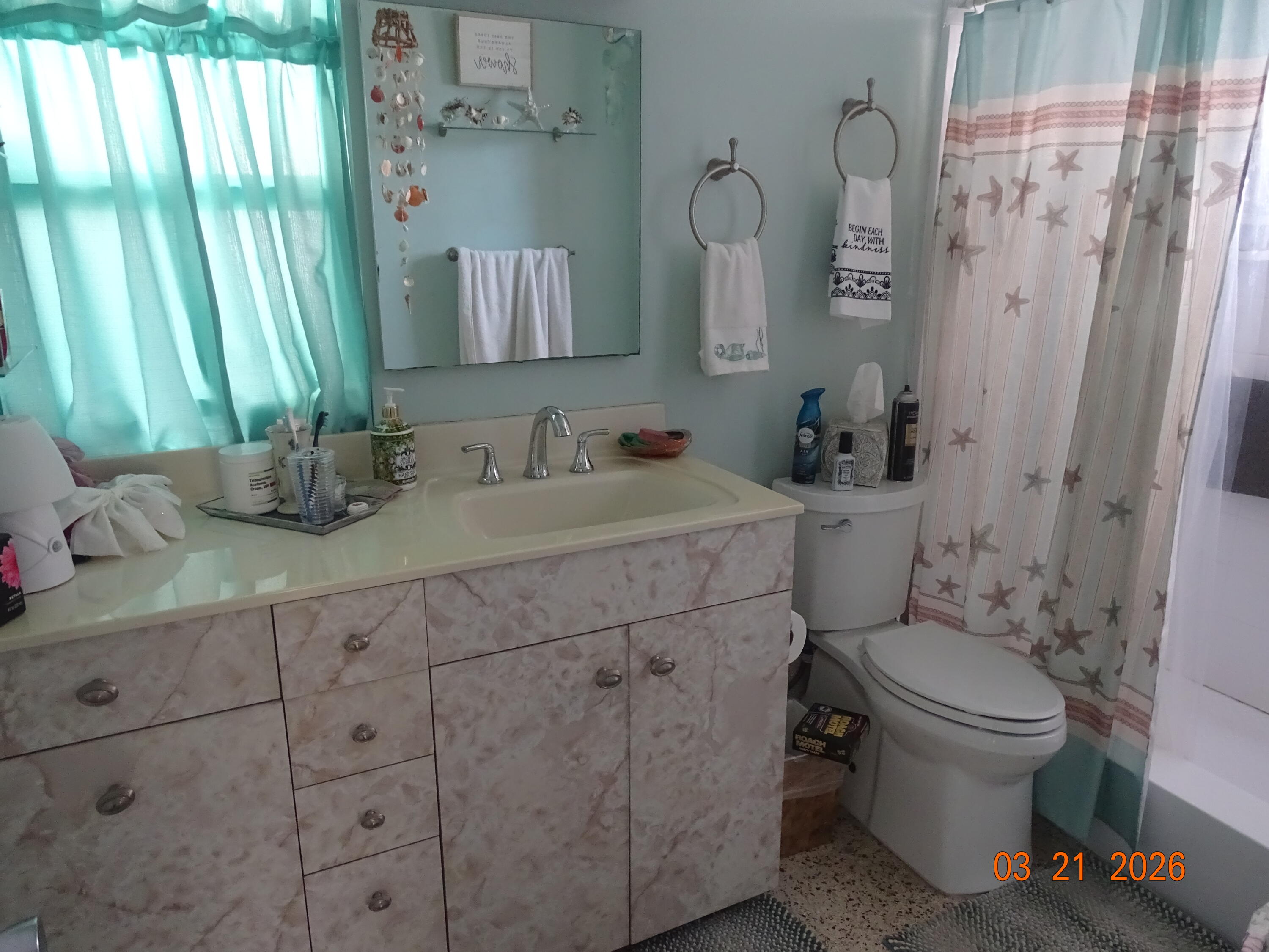 4760 Northwest 2nd Terrace Boca Raton, FL 33431 - Photo 21 of 25 a bathroom with a sink toilet and shower