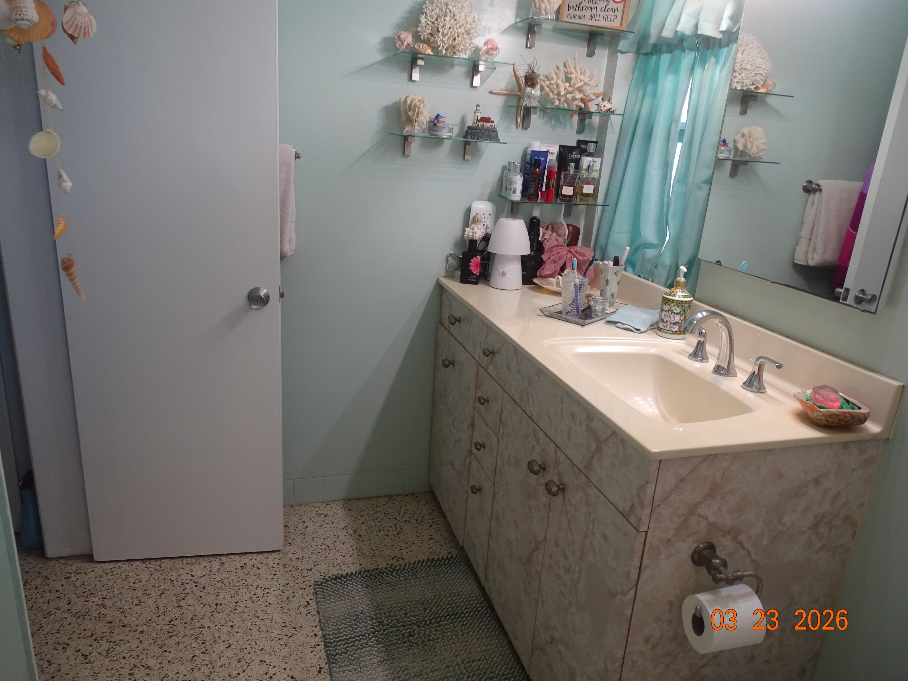 4760 Northwest 2nd Terrace Boca Raton, FL 33431 - Photo 22 of 25 a bathroom with a sink vanity and a mirror