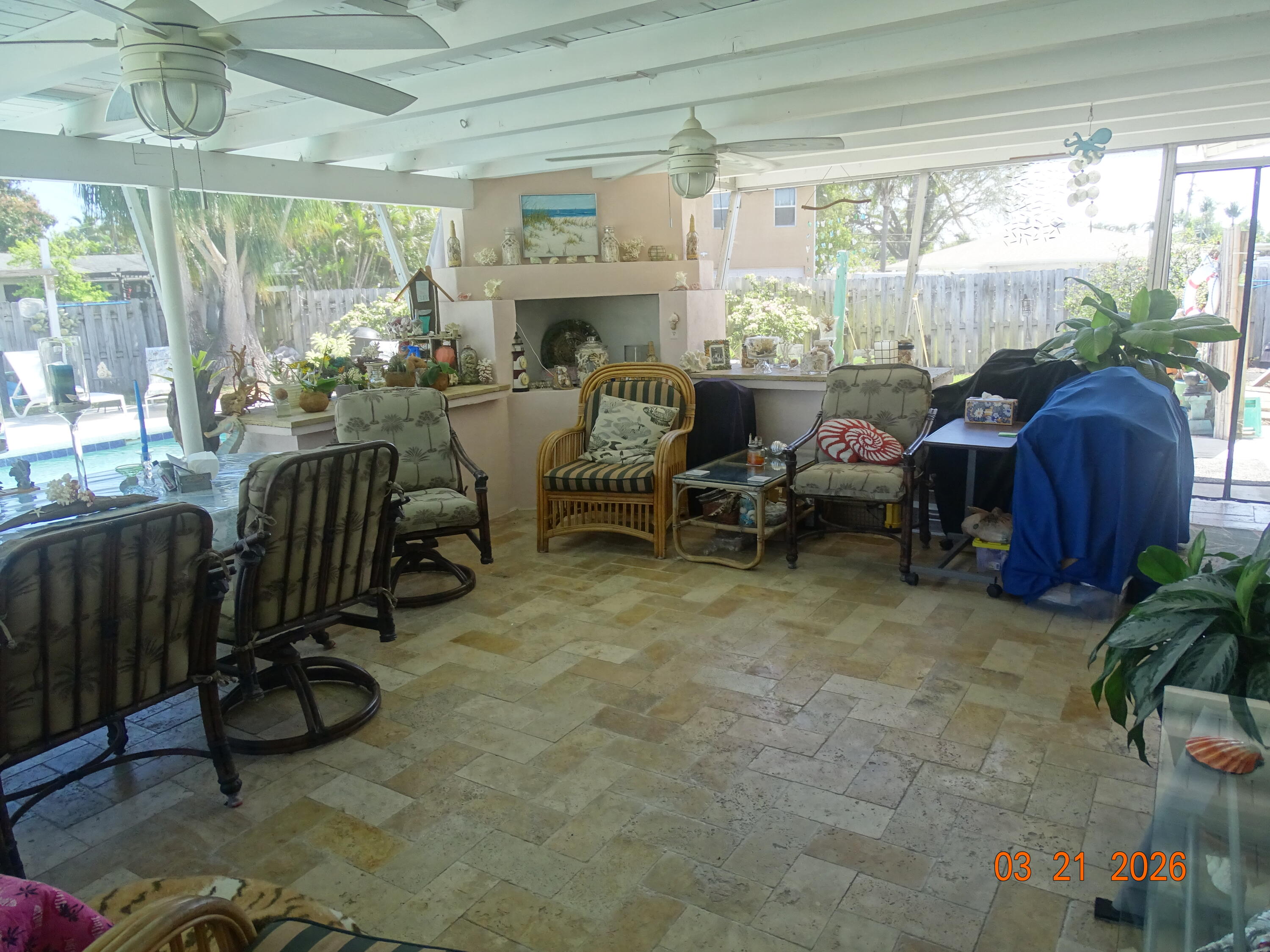 4760 Northwest 2nd Terrace Boca Raton, FL 33431 - Photo 23 of 25 a room with lots of furniture and a potted plant