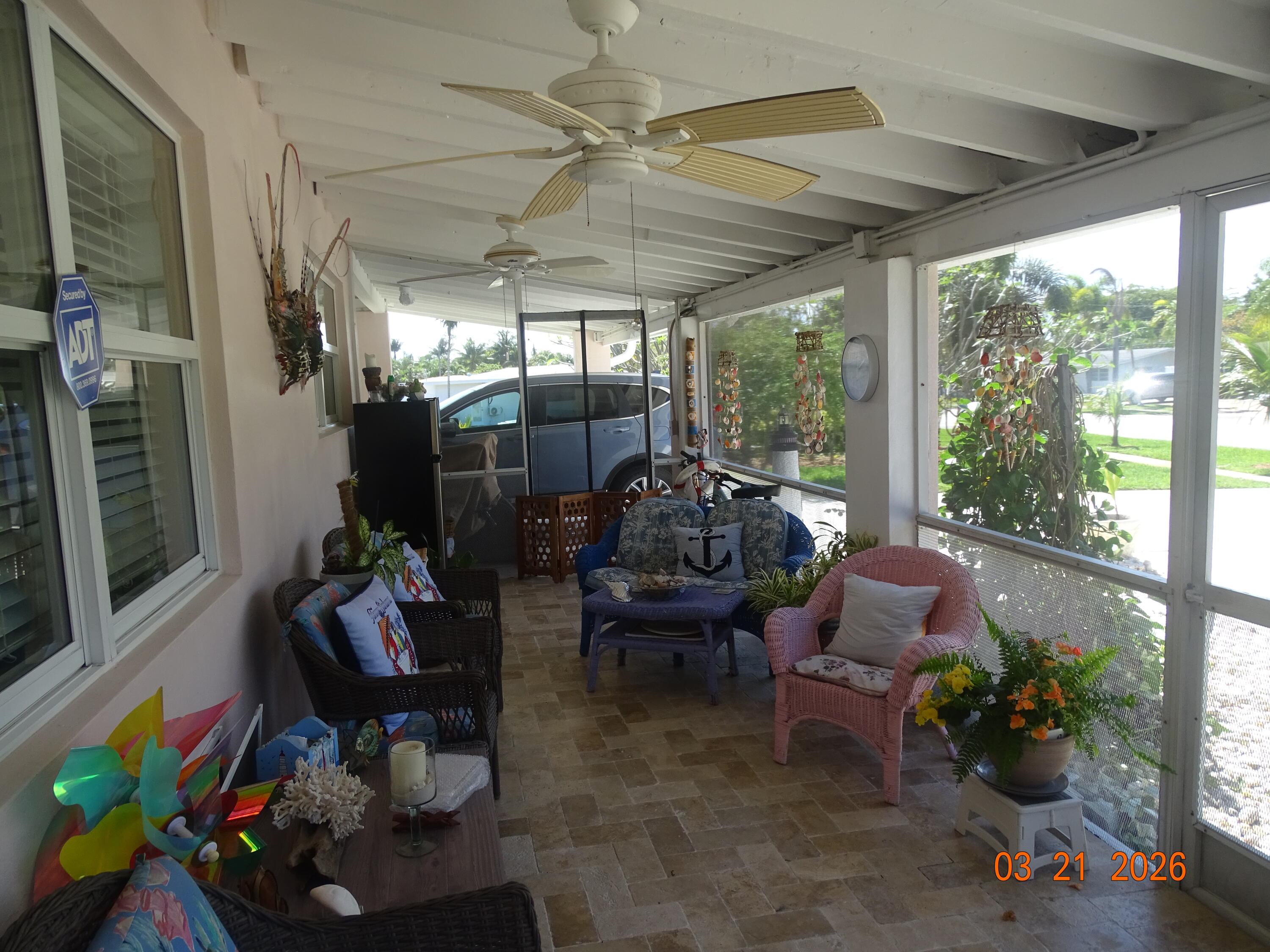 4760 Northwest 2nd Terrace Boca Raton, FL 33431 - Photo 9 of 25 a outdoor living space with furniture and garden view