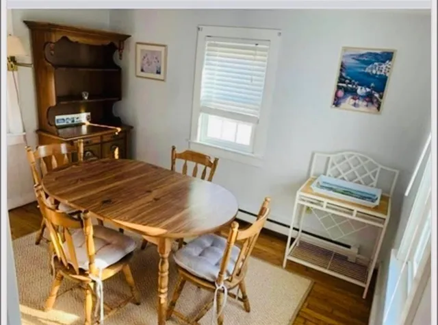 a dining room with a desk and chair