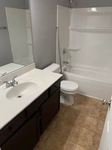 a view of a backyard with a garden