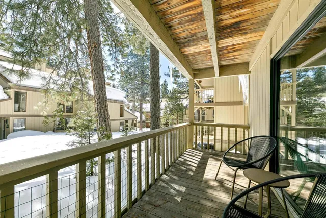 a view of a two chair with wooden deck