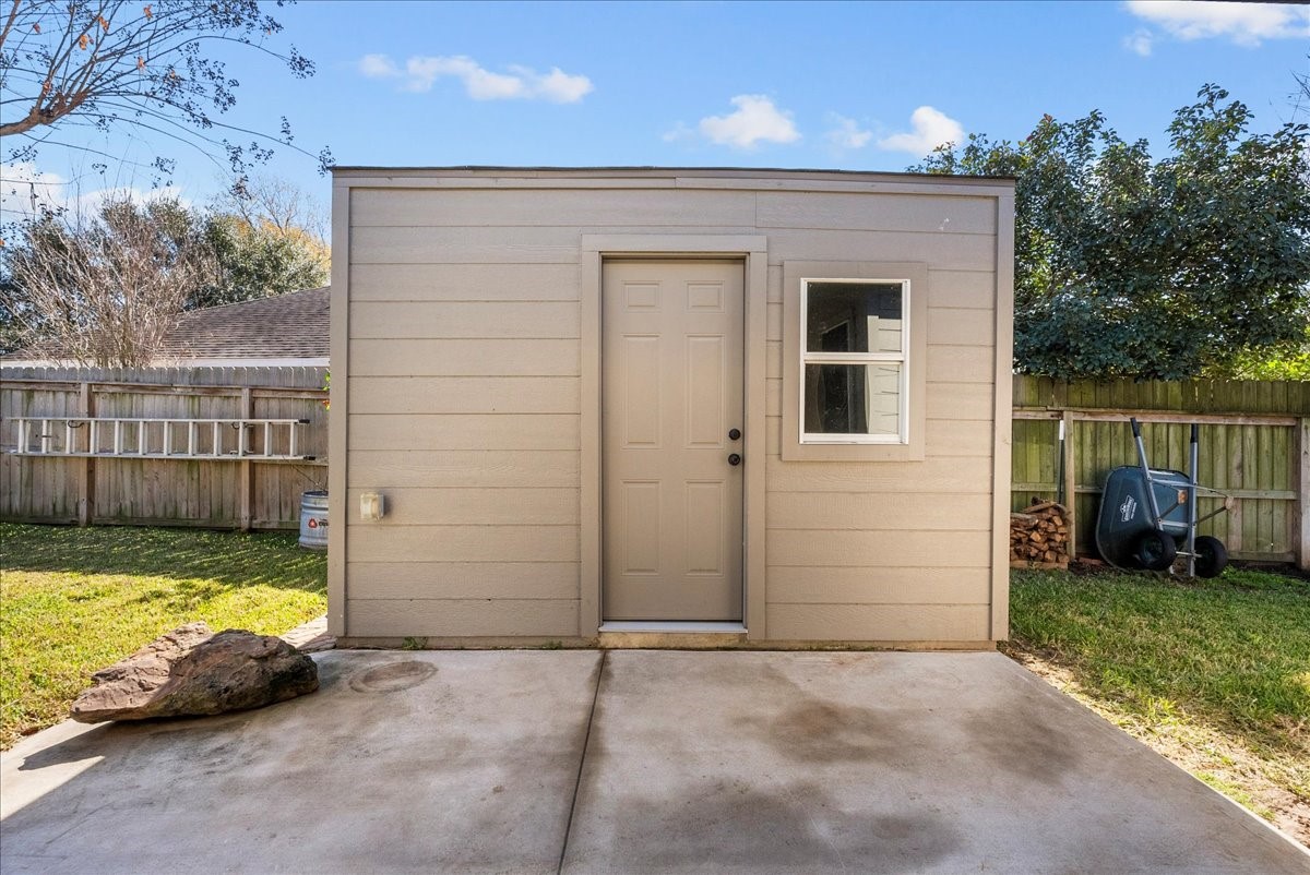 8102 Pinewood Park Humble, TX 77346 - Photo 29 of 37 a view of a house with backyard and swimming pool
