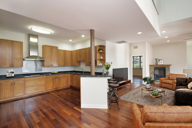4 Rienzi Lane Highwood, IL 60040 - Photo 5 of 10 a living room with stainless steel appliances furniture and a wooden floor