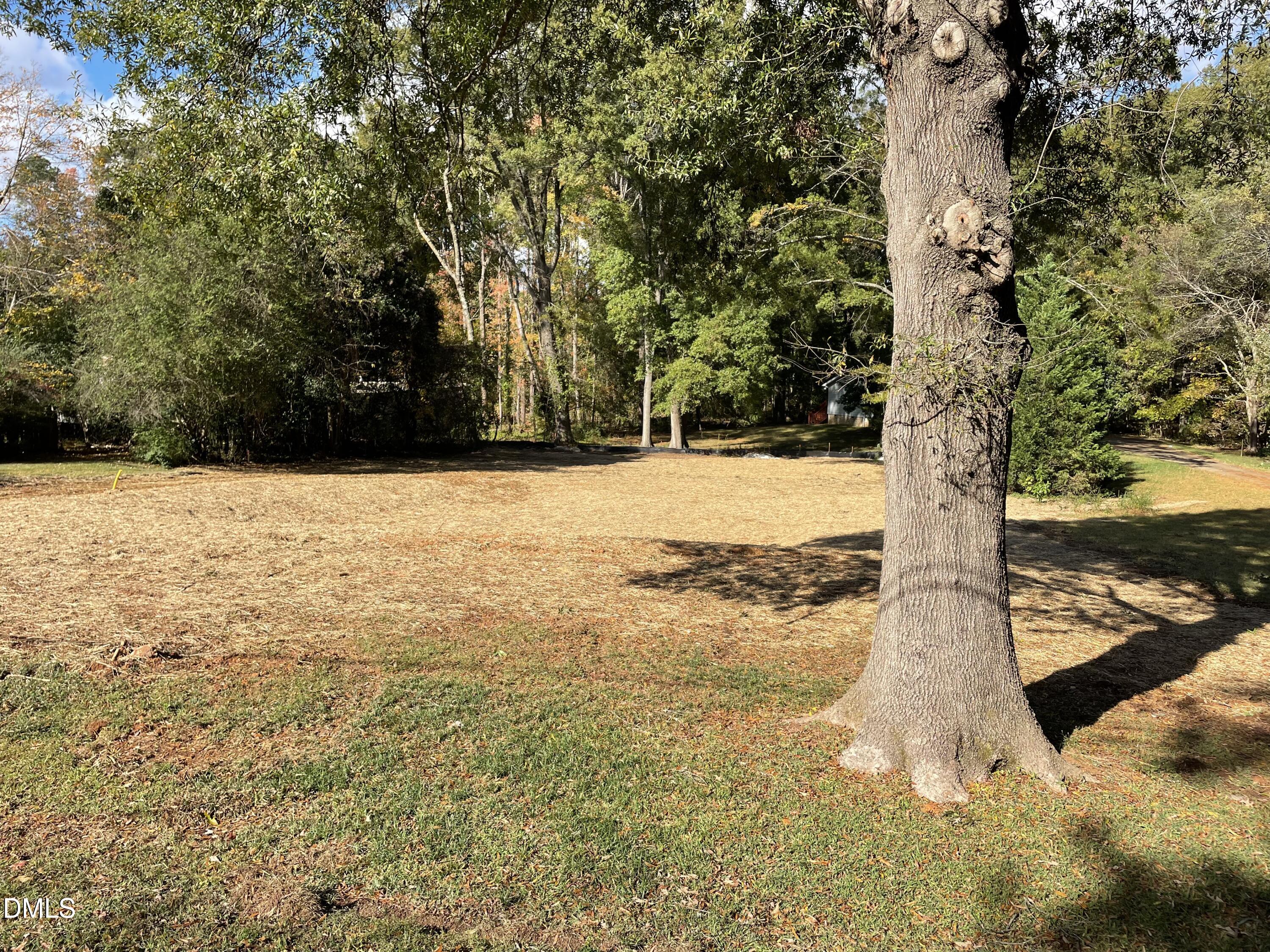 111 East Cornwall Road Cary, NC 27511 - Photo 2 of 3 a view of a yard with trees