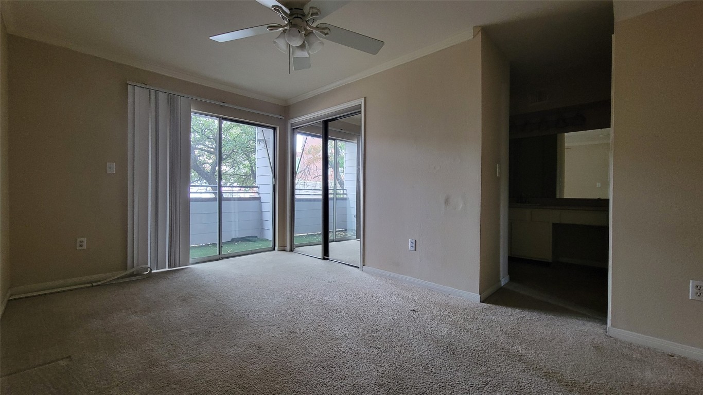 501 West 26th Street, Unit 120 Austin, TX 78705 - Photo 4 of 10 a view of an empty room with a window