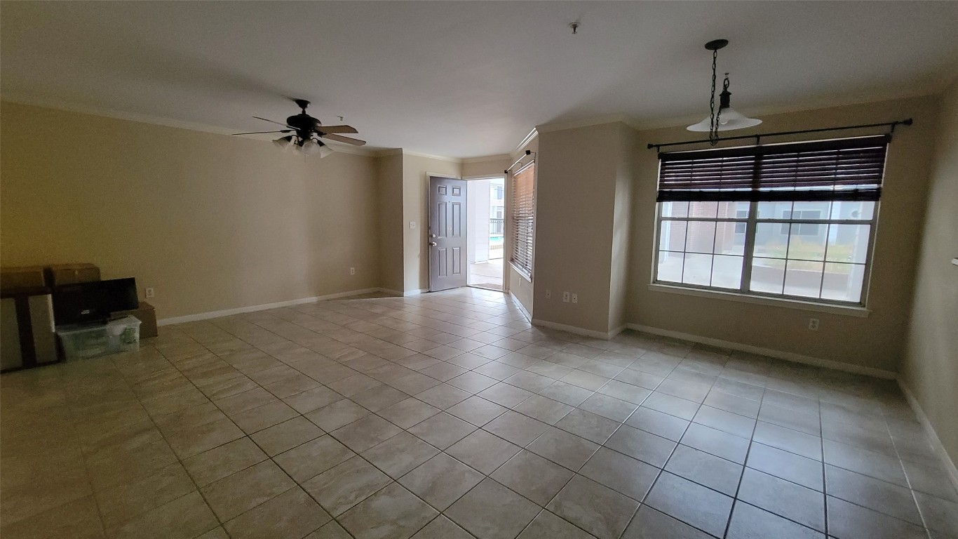 501 West 26th Street, Unit 120 Austin, TX 78705 - Photo 6 of 10 a view of an empty room with a window