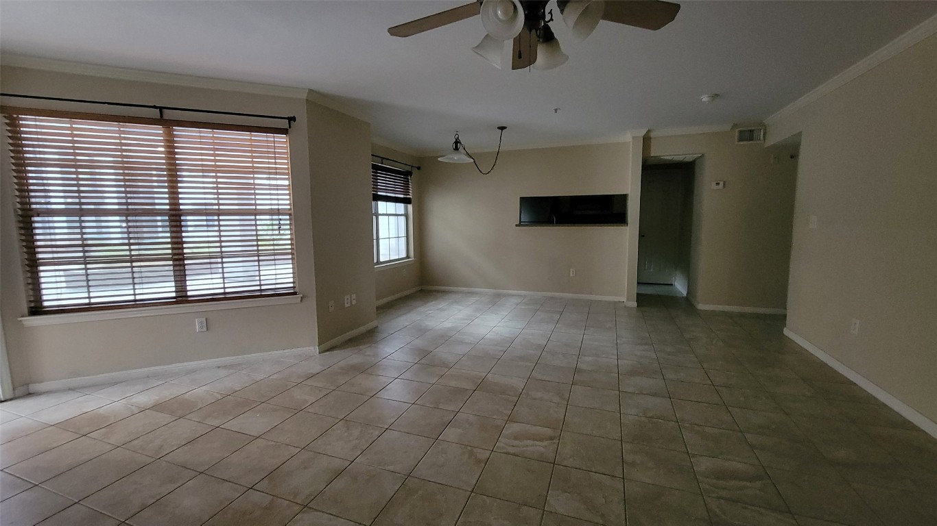 501 West 26th Street, Unit 120 Austin, TX 78705 - Photo 9 of 10 a view of an empty room with a window