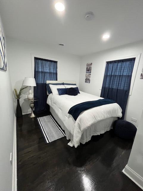 2801 Central Drive Gary, IN 46407 - Photo 15 of 19 a bedroom with a bed lamps and wooden floor