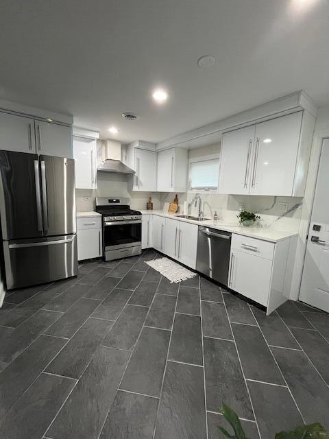 2801 Central Drive Gary, IN 46407 - Photo 6 of 19 a kitchen with stainless steel appliances a sink a stove a refrigerator and cabinets