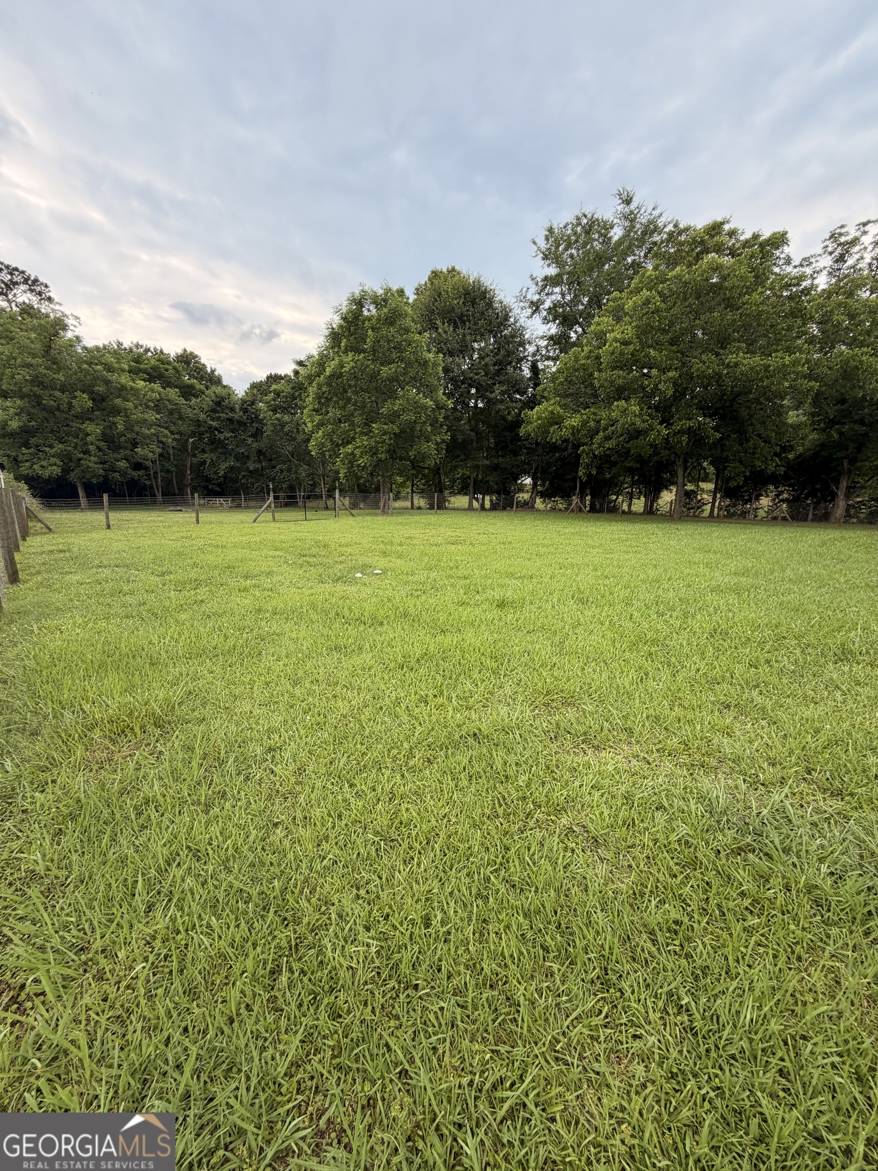 892 Perimeter Road Monticello, GA 31064 - Photo 34 of 38 a view of field with trees in the background