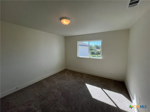 an empty room with window