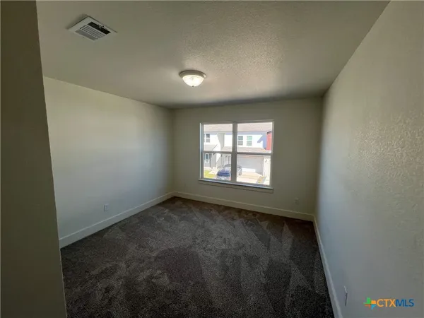 an empty room with an empty space