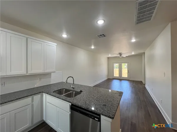 a bathroom with a toilet and a sink