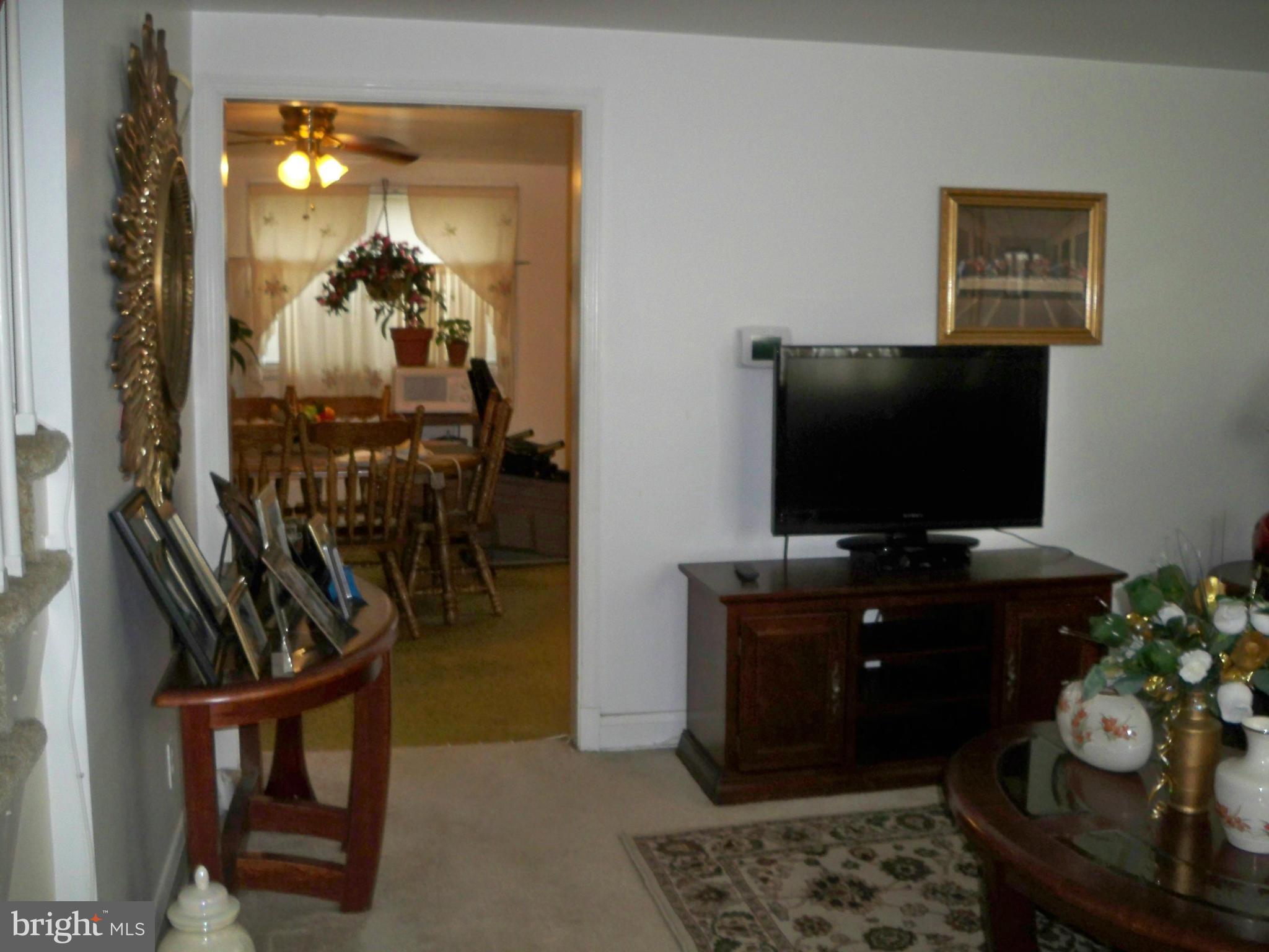 1338 Halstead Road Baltimore, MD 21234 - Photo 13 of 22 a living room with furniture and a flat screen tv