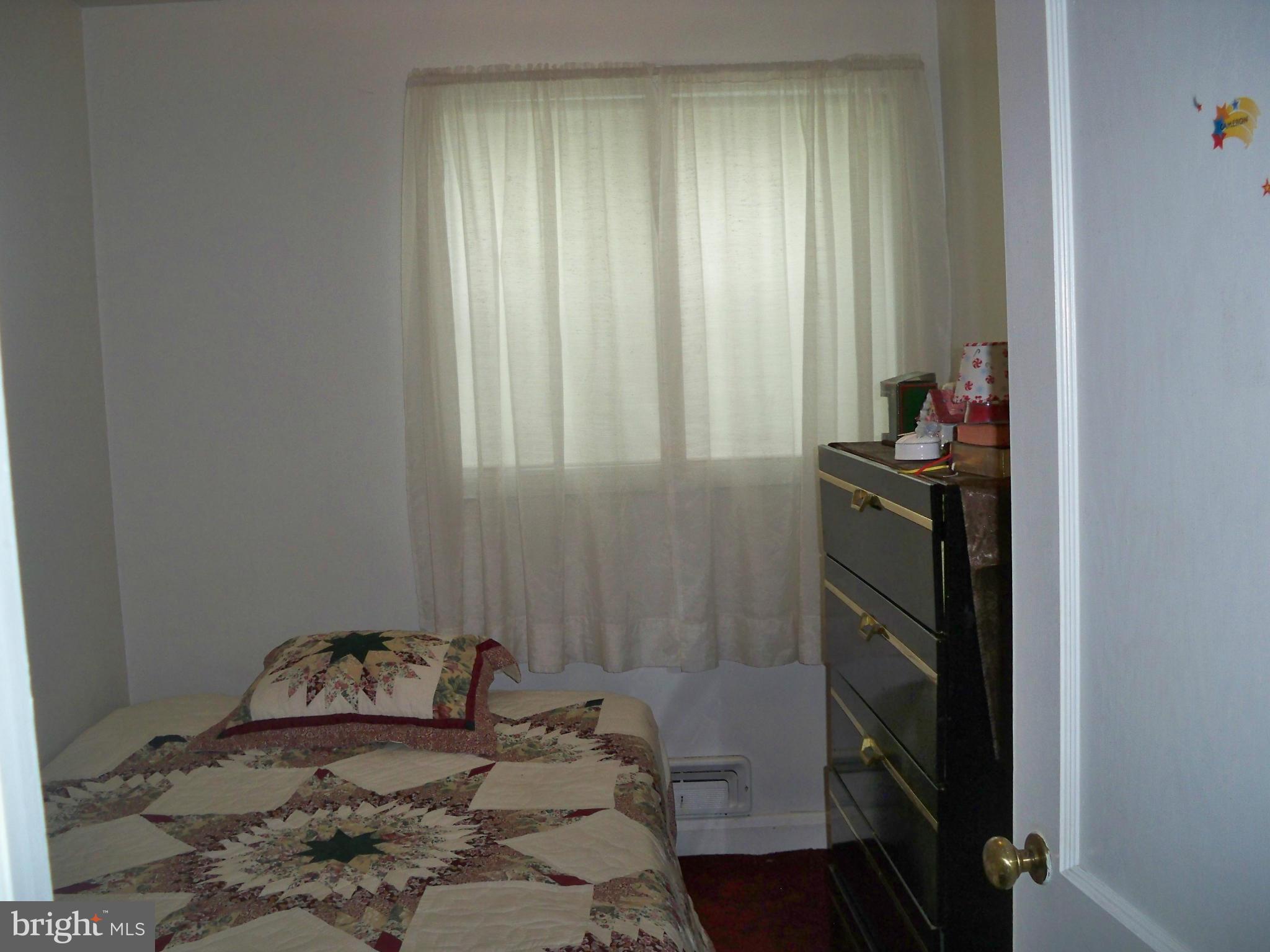 1338 Halstead Road Baltimore, MD 21234 - Photo 17 of 22 a bedroom with a bed and a closet