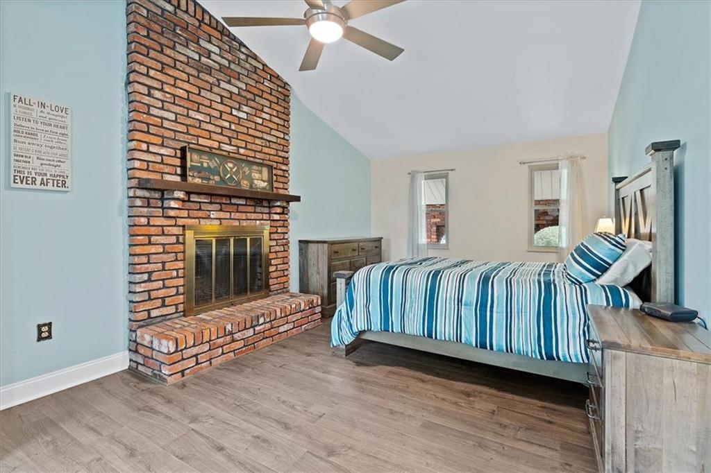 102 Bertley Ridge Drive Coraopolis, PA 15108 - Photo 13 of 24 a living room with furniture a fireplace and a flat screen tv