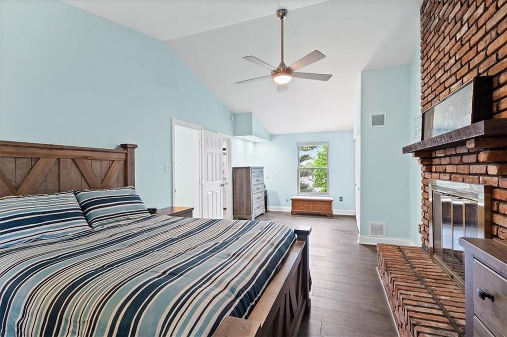 102 Bertley Ridge Drive Coraopolis, PA 15108 - Photo 14 of 24 a bedroom with a bed and a chandelier