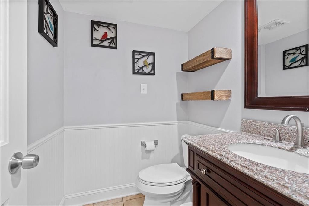 102 Bertley Ridge Drive Coraopolis, PA 15108 - Photo 7 of 24 a bathroom with a granite countertop toilet sink and mirror