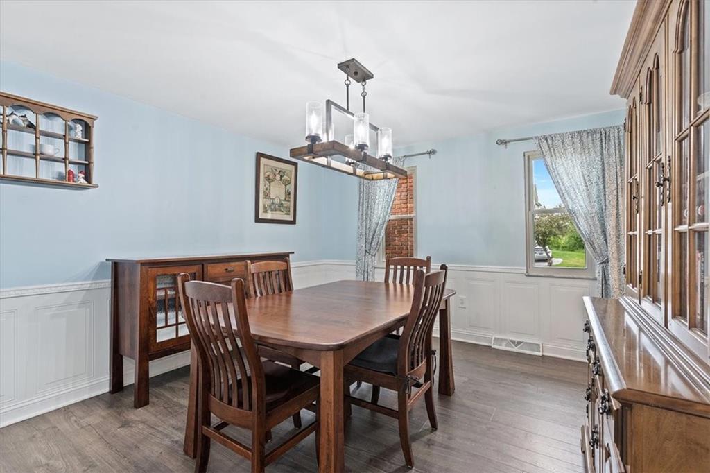 102 Bertley Ridge Drive Coraopolis, PA 15108 - Photo 8 of 24 a view of a dining room with furniture window and wooden floor