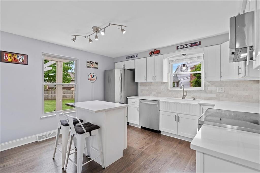 102 Bertley Ridge Drive Coraopolis, PA 15108 - Photo 10 of 24 a kitchen with a sink appliances and cabinets