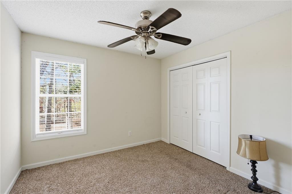 355 Radcliffe Trace Covington, GA 30016 - Photo 19 of 28 a view of workspace with window