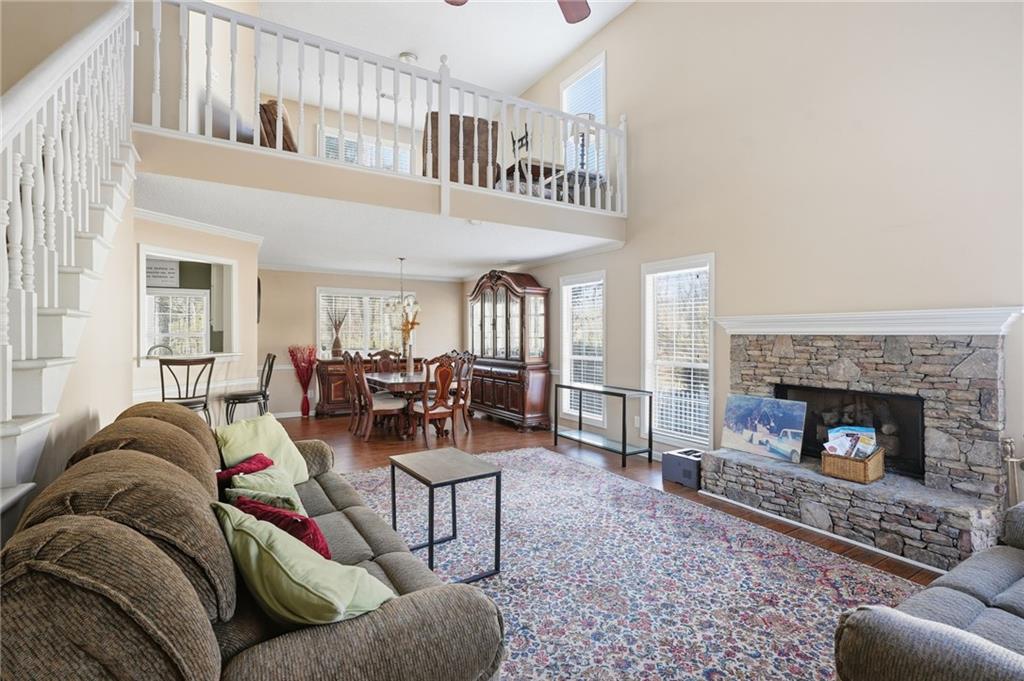 355 Radcliffe Trace Covington, GA 30016 - Photo 2 of 28 a living room with furniture and a fireplace