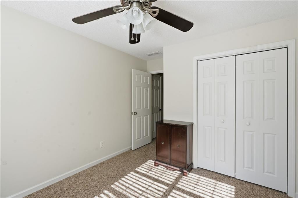 355 Radcliffe Trace Covington, GA 30016 - Photo 22 of 28 wooden floor in an empty room